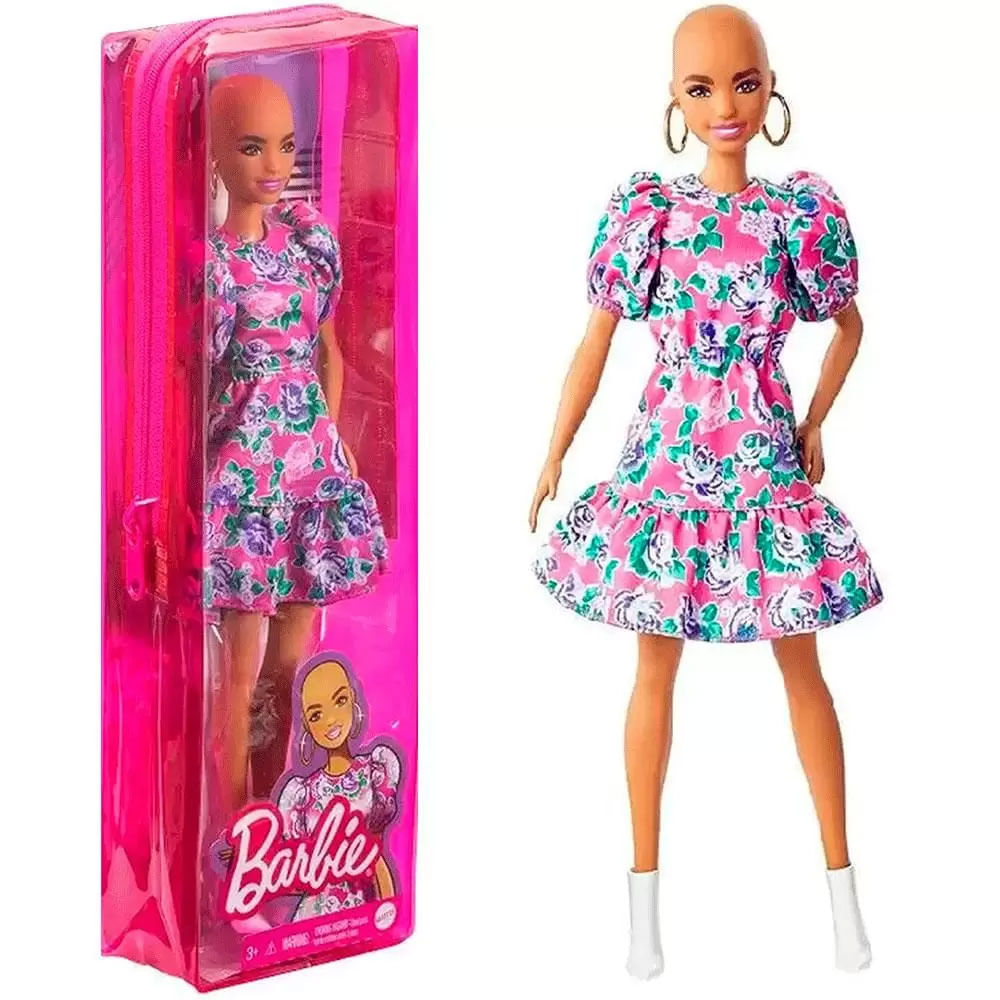 Três bonecas barbie em diferentes roupas e cores de pele